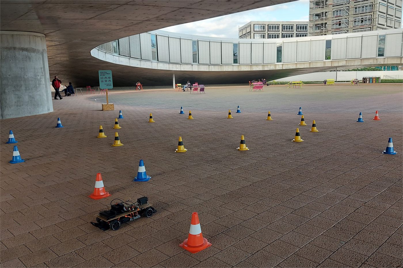 RC car running through a cone-marked test track